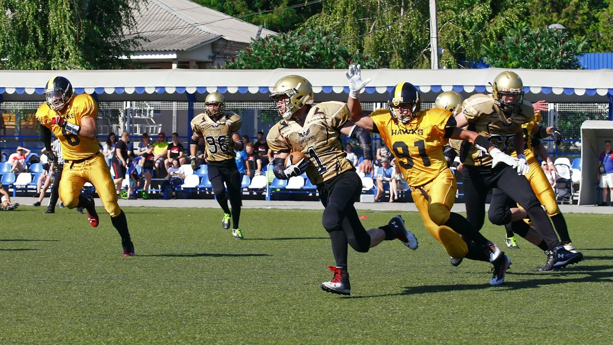 Football players at the line of scrimmage